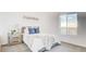 Bright bedroom featuring neutral tones, a comfortable bed, and a window with a scenic view at 1187 Blossom Point St # 36, Las Vegas, NV 89135
