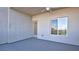 Covered patio with a ceiling fan and views of the surrounding neighborhood at 1187 Blossom Point St # 36, Las Vegas, NV 89135