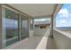 Open-air balcony area with a view of the community, accessible via sliding glass door at 12123 Glentana View St, Las Vegas, NV 89138