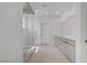 Modern bathroom with a walk-in glass shower, double sinks, and bright lighting at 12123 Glentana View St, Las Vegas, NV 89138