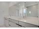 Contemporary bathroom featuring double sinks, modern vanity, and a glass-enclosed shower at 12123 Glentana View St, Las Vegas, NV 89138
