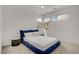 Bedroom featuring natural light, carpeted floor and a blue plush queen-sized bed at 12123 Glentana View St, Las Vegas, NV 89138