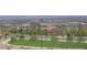 Neighborhood scenery with landscaping, nearby houses, city skyline and blue skies at 12123 Glentana View St, Las Vegas, NV 89138