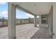 The covered patio features brick floors and nice neighborhood views at 12123 Glentana View St, Las Vegas, NV 89138