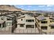 Two-story home features an upper balcony and covered patio, with a desert landscape and mountain views at 12123 Glentana View St, Las Vegas, NV 89138