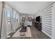 Bright exercise room with large windows, workout equipment and a modern, striped accent wall at 12311 Middle Creek St, Las Vegas, NV 89138