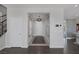 Inviting foyer with modern light fixtures and hardwood floors leading into a spacious living area at 12311 Middle Creek St, Las Vegas, NV 89138