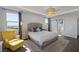 The main bedroom showcases a tray ceiling, view windows, and ensuite bathroom at 12311 Middle Creek St, Las Vegas, NV 89138