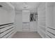 Spacious walk-in closet featuring custom shelving, drawers, and ample storage for wardrobe needs at 12311 Middle Creek St, Las Vegas, NV 89138