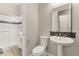 Cozy bathroom with walk-in shower, white vanity, and chrome fixtures at 12550 Point Sierra St, Las Vegas, NV 89138