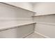 Walk-in closet with multiple shelves providing ample storage and organization options for clothing and accessories at 12550 Point Sierra St, Las Vegas, NV 89138