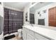 Well-lit bathroom features a stylish shower curtain and neutral-toned vanity at 1500 Tumbleweed Dr, Henderson, NV 89002