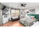 Bright bedroom featuring a window with natural light and colorful decor at 1500 Tumbleweed Dr, Henderson, NV 89002
