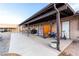 Exterior of the house with a covered patio, showing access to the backyard and recreational vehicle parking at 1500 Tumbleweed Dr, Henderson, NV 89002