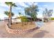 Inviting single-story home with solar panels, desert landscaping, and a spacious driveway at 1500 Tumbleweed Dr, Henderson, NV 89002