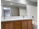Bathroom features a double sink vanity with granite countertop and tiled shower at 2105 William Holden Ct, Las Vegas, NV 89142