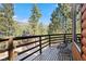 Spacious balcony with seating, overlooking trees and mountains at 2160 Via Vita St, Mount Charleston, NV 89124
