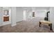 Basement offering versatile living space with carpet, columns, and a glimpse into another room at 2160 Via Vita St, Mount Charleston, NV 89124