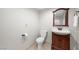 Classic bathroom featuring a vanity with wood cabinets, a sink, a toilet, and tile flooring at 2160 Via Vita St, Mount Charleston, NV 89124