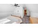 Bright bedroom with wooden furniture, neutral carpet, and view to the stairs at 2160 Via Vita St, Mount Charleston, NV 89124