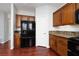 Kitchen with stainless steel refrigerator, granite countertops and lots of cabinet space at 240 Jumping Springs Pl, Henderson, NV 89012