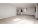 Spacious living room features neutral paint colors, plush carpet, and ample natural light at 240 Jumping Springs Pl, Henderson, NV 89012