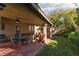 Covered patio boasts brick flooring, ceiling fans and great space for seating at 240 Jumping Springs Pl, Henderson, NV 89012