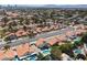 Wide aerial view of the neighborhood highlighting streets, mature trees, and red tile roofs at 2712 Sidonia Ave, Las Vegas, NV 89102