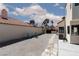 Relax in the gravel backyard with ample space and privacy, enhanced by a stone walkway at 2712 Sidonia Ave, Las Vegas, NV 89102