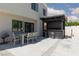Backyard patio with outdoor bar, dining table, and grill, perfect for outdoor gatherings at 2712 Sidonia Ave, Las Vegas, NV 89102