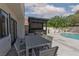 Inviting backyard with patio, outdoor bar, and pool, ideal for entertaining guests at 2712 Sidonia Ave, Las Vegas, NV 89102