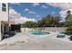 Enjoy outdoor living with a pool, bar, patio, and lush desert landscaping in this inviting backyard at 2712 Sidonia Ave, Las Vegas, NV 89102
