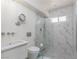 Modern bathroom with marble tile shower, sleek fixtures, and floating vanity at 2712 Sidonia Ave, Las Vegas, NV 89102