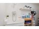 A convenient pet-washing station includes a stainless steel faucet, cabinet storage and a wooden utility table at 2712 Sidonia Ave, Las Vegas, NV 89102
