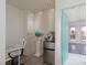 Cozy office space with decorative wallpaper, mini fridge and stylish decor at 2712 Sidonia Ave, Las Vegas, NV 89102