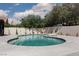 Enjoy a private pool surrounded by a patio, cacti, and a privacy wall in this backyard at 2712 Sidonia Ave, Las Vegas, NV 89102