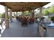 Community BBQ area featuring stone accents, grills, seating and covered shade at 2900 Sunridge Heights Pkwy # 1733, Henderson, NV 89052