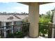 A private balcony overlooks lush landscaping and neighboring homes at 2900 Sunridge Heights Pkwy # 1733, Henderson, NV 89052