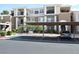 Beautiful condo building with covered parking and well-maintained landscaping at 2900 Sunridge Heights Pkwy # 1733, Henderson, NV 89052