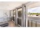 Relaxing balcony with floor to ceiling slider door and bar table at 3120 S Eastern Ave # 6, Las Vegas, NV 89169