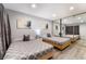 Serene bedroom featuring two beds, a large mirror, and neutral decor at 3120 S Eastern Ave # 6, Las Vegas, NV 89169