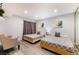 Bright bedroom featuring two twin beds, modern decor, and neutral walls at 3120 S Eastern Ave # 6, Las Vegas, NV 89169