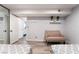 Cozy bedroom featuring light gray walls, wood floors, and slider closet at 3120 S Eastern Ave # 6, Las Vegas, NV 89169