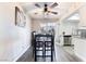 Charming dining area with modern furniture, a ceiling fan, and sliding glass doors at 3120 S Eastern Ave # 6, Las Vegas, NV 89169