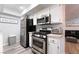 Well-equipped kitchen with stainless steel appliances and granite countertops at 3120 S Eastern Ave # 6, Las Vegas, NV 89169