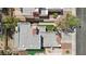 Aerial view showing the roof and backyard of a townhouse and the surrounding neighborhood at 3132 Centavo Dr, Las Vegas, NV 89117