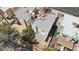 Aerial view of a backyard and townhouse with a patio, grass, and outdoor furniture at 3132 Centavo Dr, Las Vegas, NV 89117