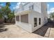 Exterior of a two-story home with a white balcony overlooking the backyard and desert landscaping at 3132 Centavo Dr, Las Vegas, NV 89117
