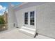 Second story outdoor patio with stucco and a door that leads into the house at 3132 Centavo Dr, Las Vegas, NV 89117
