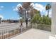 A view from the balcony of a commercial district with mature shade trees at 3132 Centavo Dr, Las Vegas, NV 89117